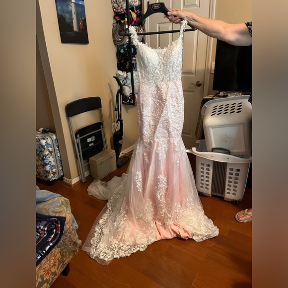 Beautiful pink and lace wedding dress from flormiss size is a XS. - Picture 1 of 8
